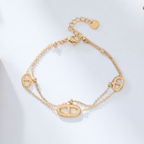 Bracelet double chaîne triple anneaux