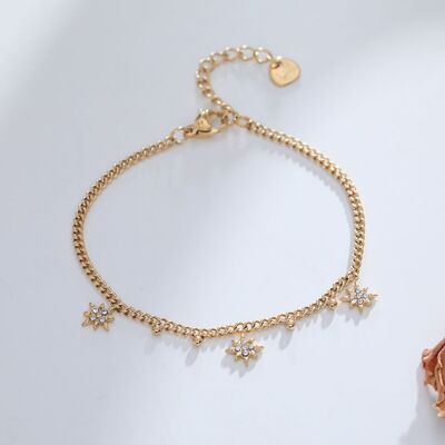 Golden chain bracelet with star pendants with rhinestones
