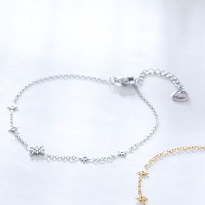Silver chain bracelet with rhinestones and star