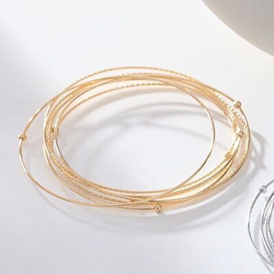 Multi bracelets joncs fins dorés