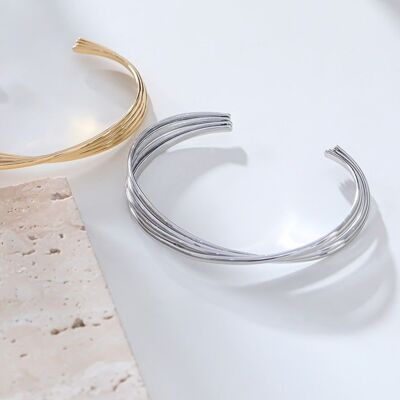 Silver crossed multi-line bangle bracelet
