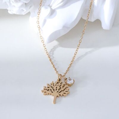 Golden chain necklace with tree of life pendant and rhinestones