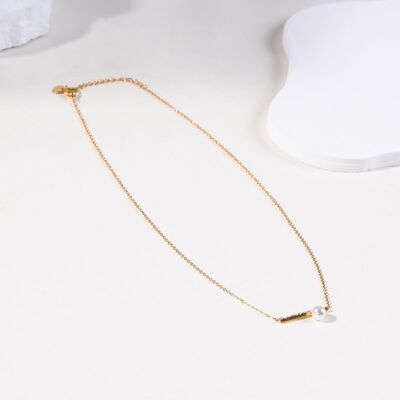 Gold chain necklace with rhinestone and pearl bar