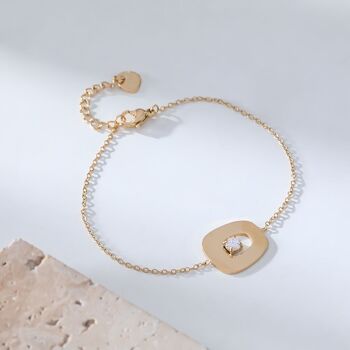 Bracelet chaîne dorée pendentif lisse avec strass 2