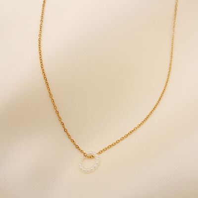 Golden chain necklace with round pearl pendant