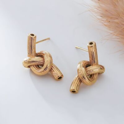 Gold stud earrings