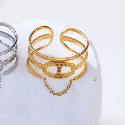 Golden lines ring with hanging chain