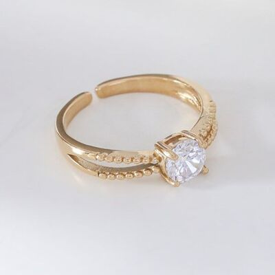 Golden solitaire style ring with rhinestones