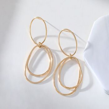 Boucles d'oreilles dorées anneaux double pendantes 1