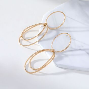 Boucles d'oreilles dorées anneaux double pendantes 2