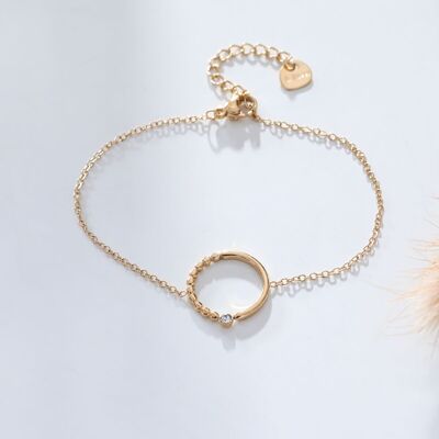 Golden chain bracelet with circle and rhinestones