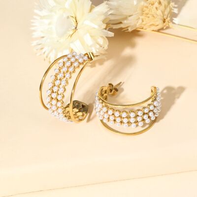 Hoop earrings with triple line of pearls