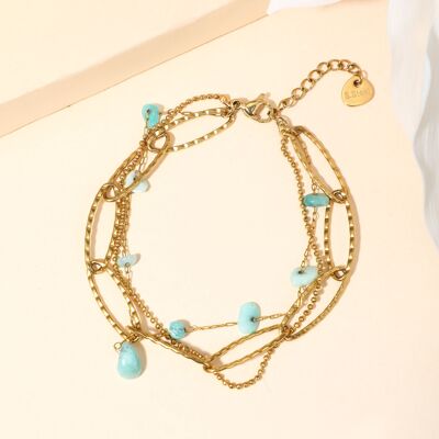 Bracelet triple chaîne avec pierres bleues