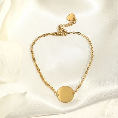 Asymmetrical gold chain bracelet with round plate