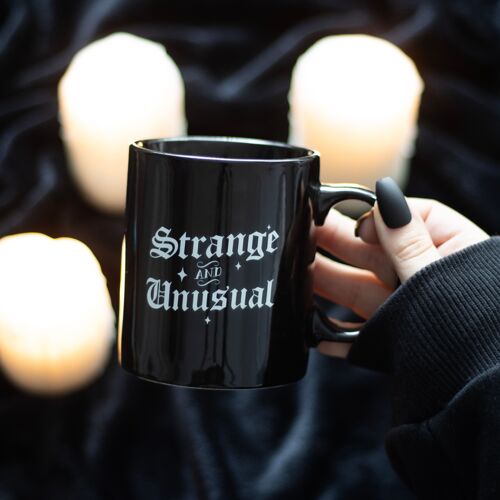 Strange and Unusual Mug