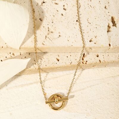 Gold chain necklace with circle and bar pendant