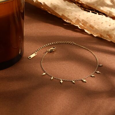 Gold chain bracelet with mini lightning pendants