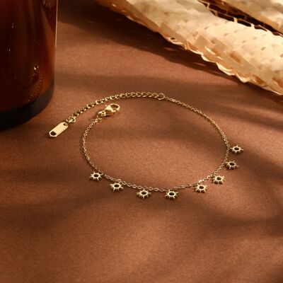 Golden chain bracelet with mini sun pendants