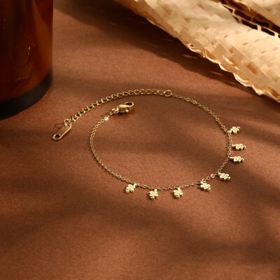 Gold chain bracelet with mini snake pendants