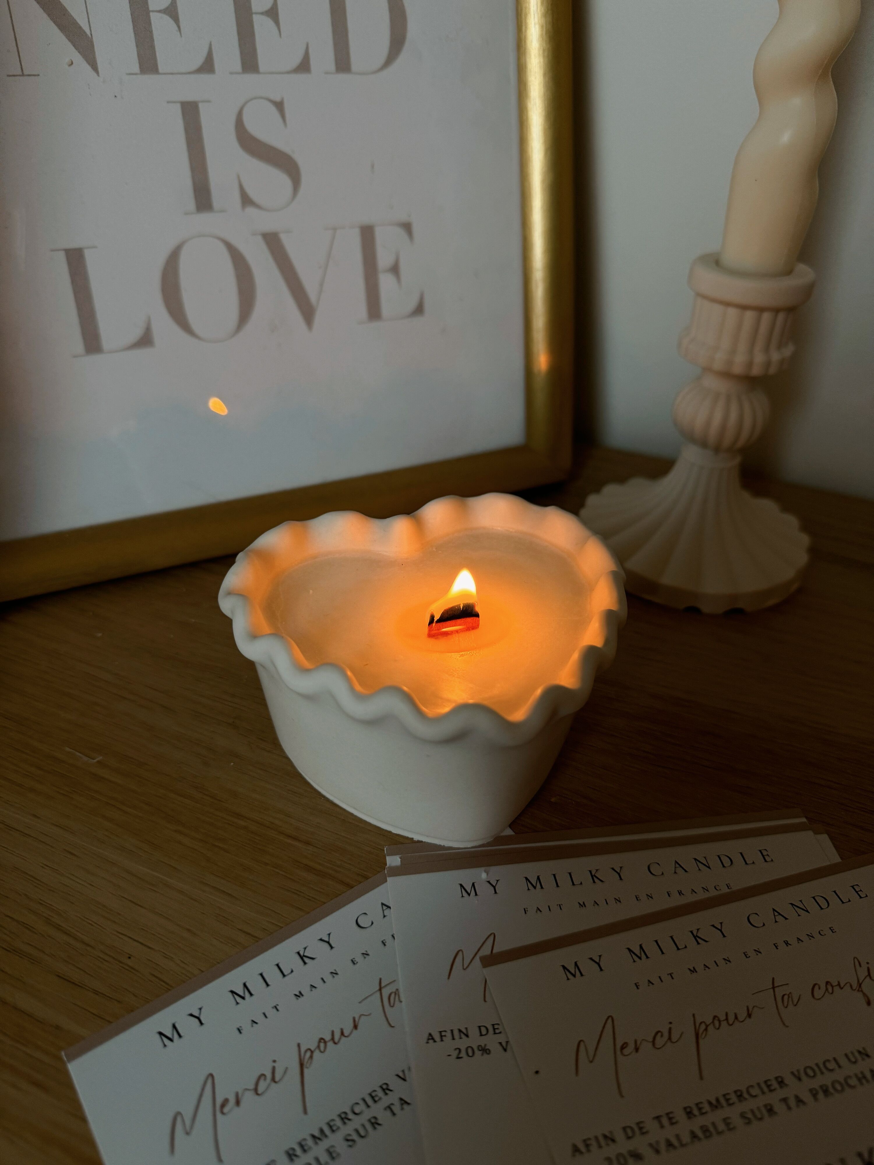 Candle containing handmade heart