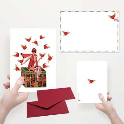 Greeting card folded in half with envelope, lady catches hearts