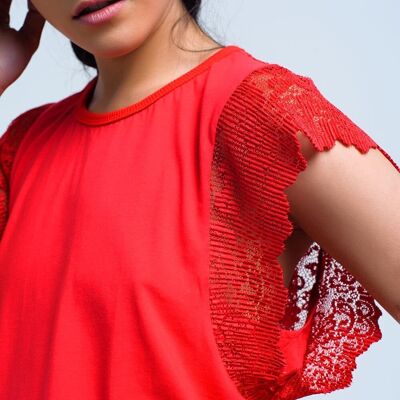 Red top with lace back and ruffles