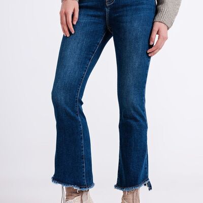 High waisted jeans with asymmetrical hem