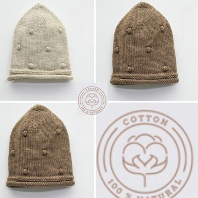 Una confezione di quattro misure di cappello popcorn lavorato a maglia in morbida lana elegante