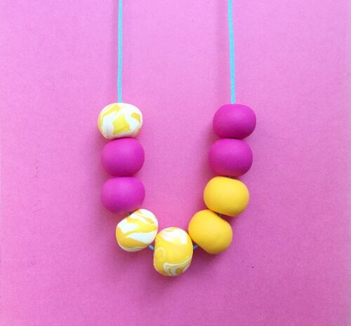 Pink and yellow statement necklace