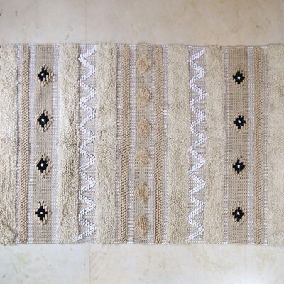 Textured Rug with Panels & Braided Tassels