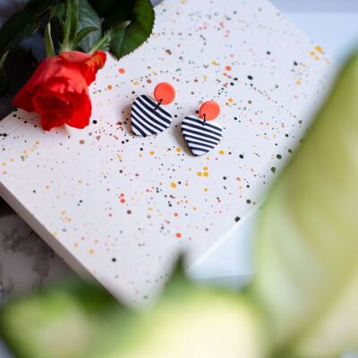 Neon orange and black & white striped heart earrings