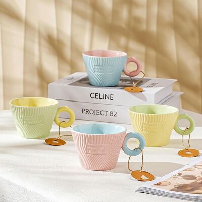 Ceramic mug with embossed design in 4 pastel color combinations. Dimension: 13.1x9.6x7cm Capacity: 250ml LM-225