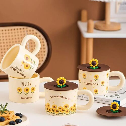 Ceramic mug "SUNFLOWER" with decorated silicone lid in 4 designs. Dimension: 14.4x11cm Capacity: 375ml LM-248