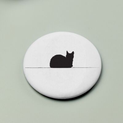 Arte de línea de botón magnético de gato negro