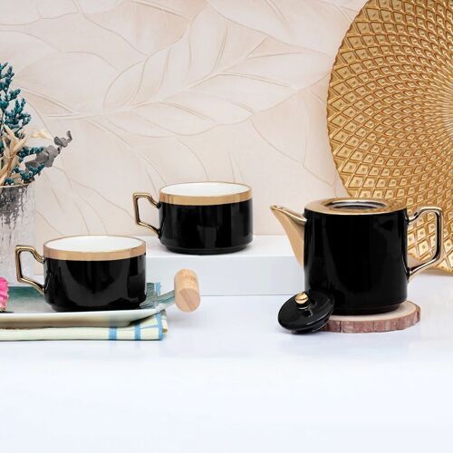Ceramic tea set in black. In a gift box that includes: a teapot with a metal filter, 2 mugs and 2 saucers. PT-163B