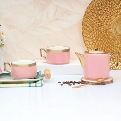 Ceramic tea set in pink. In a gift box that includes: a teapot with a metal filter, 2 mugs and 2 saucers. PT-163C