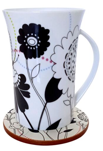 Mug en céramique "FLEURS" dans un coffret cadeau. Disponible en 2 modèles. Dimension : 10x9x11cm (tasse) / 9cm (sous-verre) TW-006 2