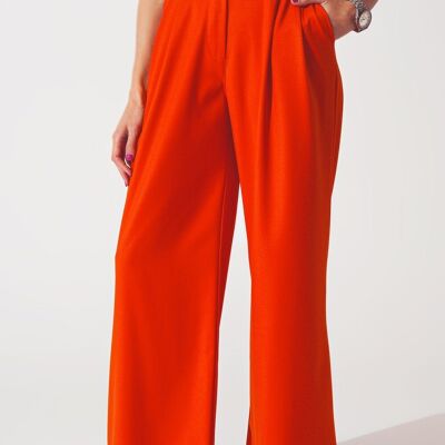 Pantalones holgados de pernera ancha en naranja de