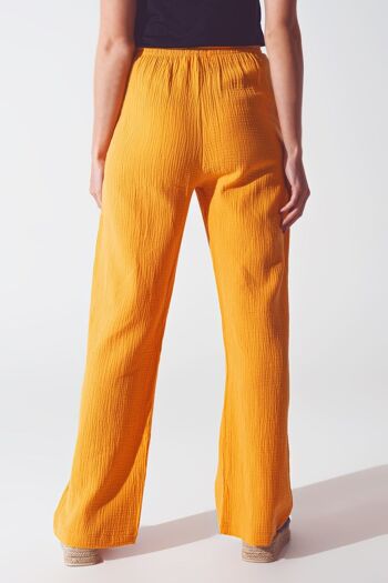 Pantalon coupe ample texturé en orange 2