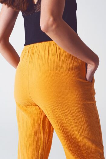Pantalon coupe ample texturé en orange 5