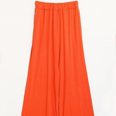 Pantalón ancho de verano de viscosa en color naranja.