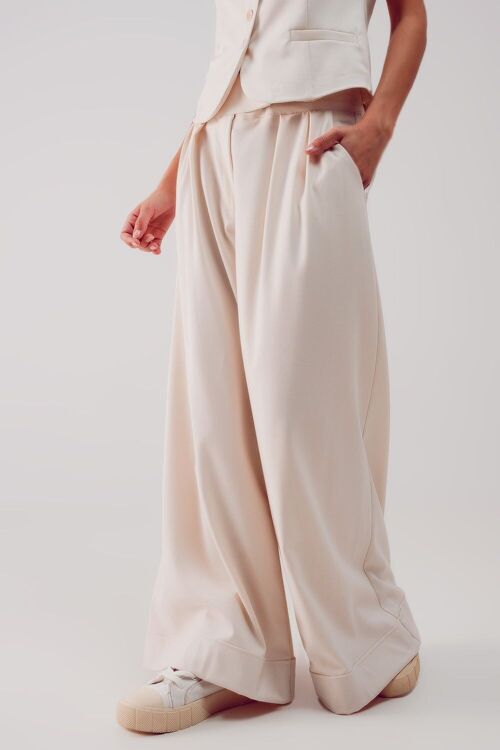 Pleated wide leg pants in cream