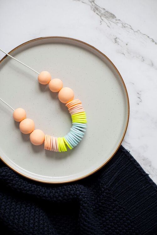 Peach, cream, ice blue and neon yellow statement necklace