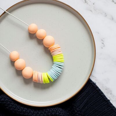 Peach, cream, ice blue and neon yellow statement necklace