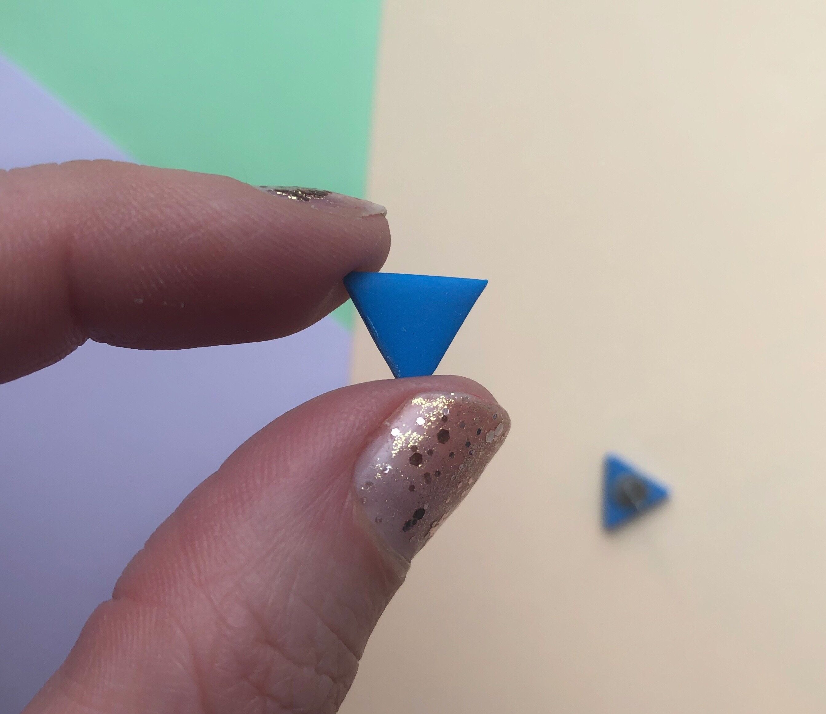 Blue triangle stud earrings