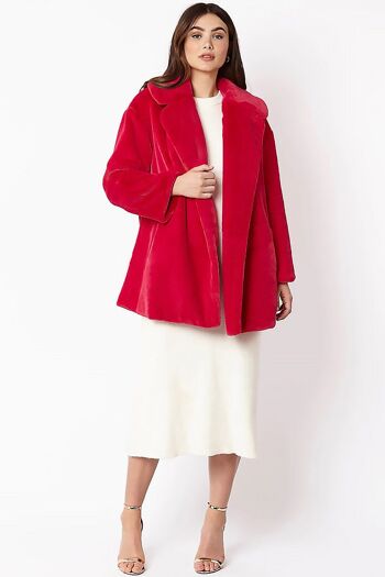 Manteau mi-long rose en fausse fourrure 1