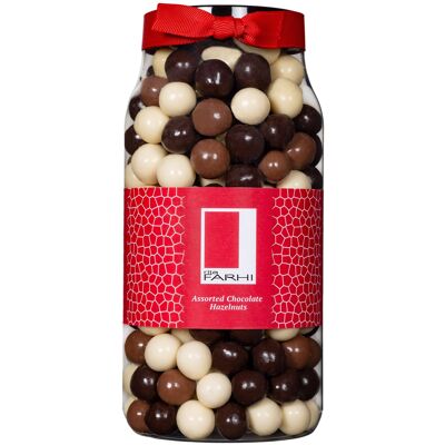 Nocciole ricoperte di cioccolato assortite in un vasetto regalo gourmet