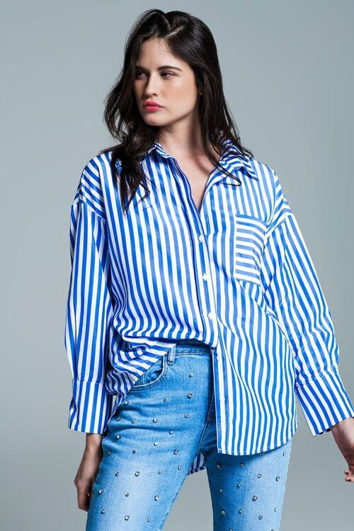White oversized blouse with vertical stripes in blue and chest pocket