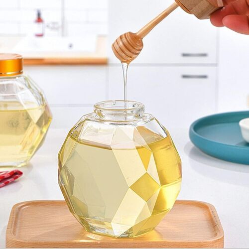 Glass honey jar with wooden lid and dipper. Dimension: 8.8x9.5cm Capacity: 200ml SD-030