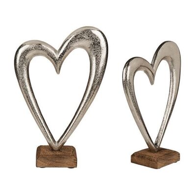 Silver-colored metal heart on a wooden base, 3